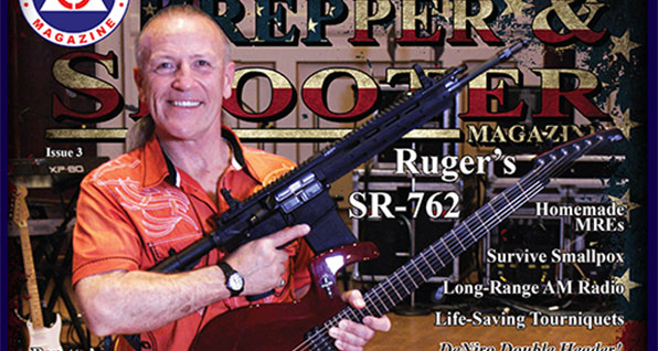 Grand Funk's Mark Farner with guitar and AR