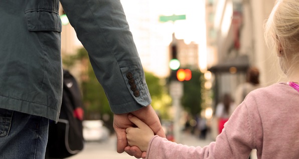 Parent child holding hands