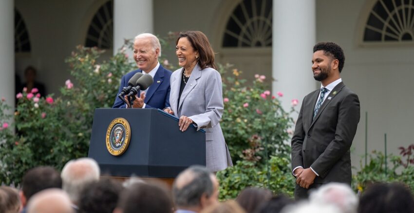 President Joe Biden stands next to Vice President Kamala Harris at the White House Rose Garden during a speech announcing a new Office of Gun Violence Prevention. At right is U.S. Rep. Maxwell Frost, D-Florida.