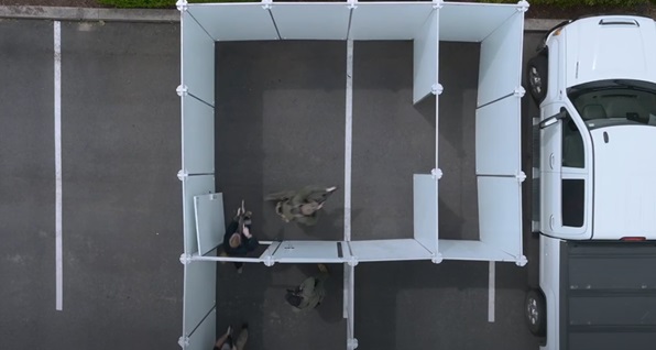 Participants enter a shoot house, as shown in this still from a Kontek Industries YouTube video.